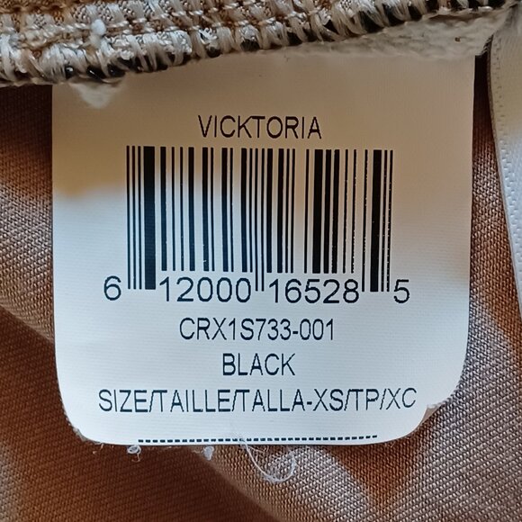 EUC BCBGMaxAzria "Vicktoria" Mixed-Knit Black Peplum Top Size XS - Picture 9 of 11